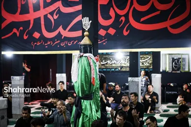گزارش تصویری | مراسم علم کشیِ مهاجران افغانستانی در گلشهر مشهد