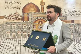 اهدای مدال طلای جهانی عکاسی به موزه آستان قدس رضوی