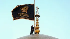 پرچم عزا بر فراز گنبد حرم رضوی درپی جنایت رژیم صهیونسیتی