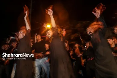 عکس‌هایی از مراسم علم کشیِ مهاجران افغانستانی در گلشهر مشهد