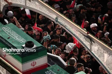 گزارش تصویری رویترز از مراسم باشکوه تشییع و خاکسپاری رهبر شهید در مشهد
