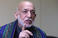 کرزی در واکنش به حمله هوایی پاکستان: مردم افغانستان پاسخ زور را با شجاعت خواهند داد