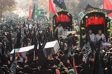 تشییع پیکر 12 شهید گمنام دفاع مقدس و 2 شهید حادثه تروریستی راسک در مشهد