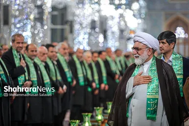 مراسم تعویض پرچم گنبد و پوش ضریح حرم مطهر ثامن الحجج (ع)