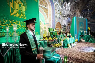 مراسم تعویض پرچم گنبد و پوش ضریح حرم مطهر ثامن الحجج (ع)