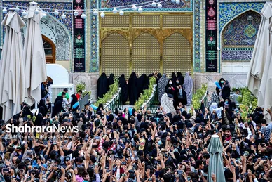 آئین اذن عزای حسینی و تعویض پرچم گنبد حرم مطهر رضوی