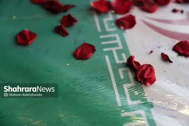 گزارش تصویری | بدرقه پیکر شهید گمنام دفاع مقدس در همایش سالیانه بسیجیان در مشهد