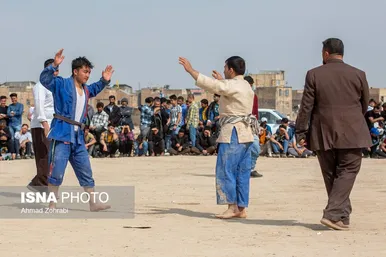 مسابقات کشتی سنتی افغانستانی‌ها به مناسبت نوروز در قم