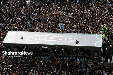 حضور مهاجران افغانستان در مراسم خاکسپاری رئیس‌جمهور شهید در مشهد