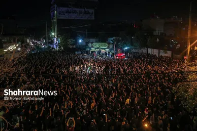 عکس‌هایی از مراسم علم کشیِ مهاجران افغانستانی در گلشهر مشهد