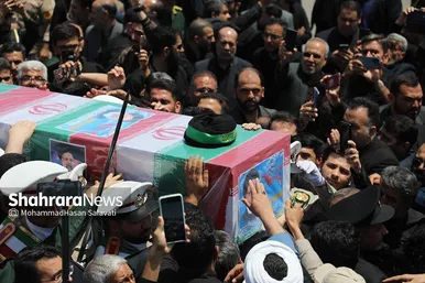 عکس‌هایی از مراسم استقبال از پیکر مطهر رئیس‌جمهور شهید در فرودگاه مشهد