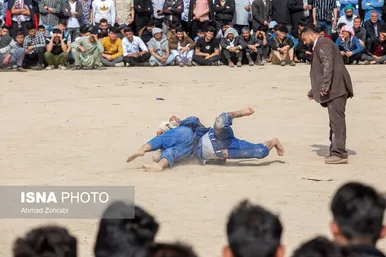 مسابقات کشتی سنتی افغانستانی‌ها به مناسبت نوروز در قم