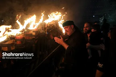 تصاویری از آئین سنتی مشعل گردانی نجفی‌های مقیم مشهد