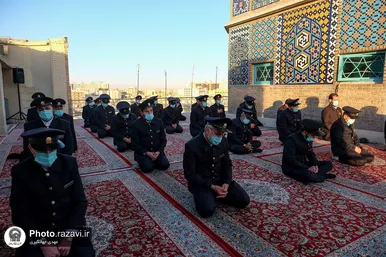 تعویض پرچم گنبد و پوش ضریح مطهر حرم رضوی همزمان با سوم ربیع الاول