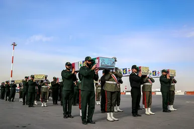 استقبال از پیکر مطهر ۱۲ شهید گمنام دفاع مقدس در فرودگاه هاشمی نژاد مشهد