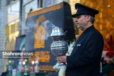 آئین اذن عزای حسینی و تعویض پرچم گنبد حرم مطهر رضوی