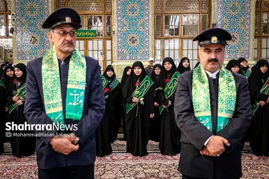 مراسم تعویض پرچم گنبد و پوش ضریح حرم مطهر ثامن الحجج (ع)