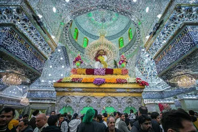 عکس‌هایی از گل‌آرایی ضریح شش گوشه امام حسین(ع)
