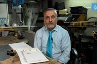 خوشنویس فلسطینی و کتابت قرآن در مسجدالاقصی