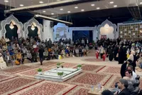 شبی که شعر، شهید و امام رضا(ع) به هم رسیدند | روایت شب شعر ارادت در میدان شهدای مشهد
