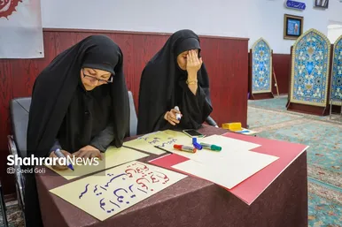 گزارش تصویری | پویش مردمی پلاکاردنویسی «باید برخاست»