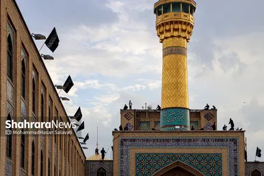 آئین اذن عزای حسینی و تعویض پرچم گنبد حرم مطهر رضوی