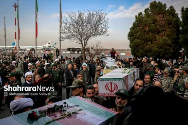 استقبال از پیکر مطهر ۱۲ شهید گمنام دفاع مقدس در فرودگاه هاشمی نژاد مشهد