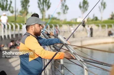 جشنواره ماهیگیری در رود پارک مشهد