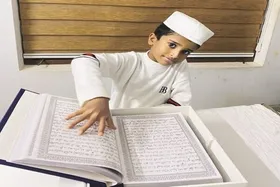 قرآن&zwnj;نویس کوچک هند، جهان را شگفت&zwnj;زده کرد