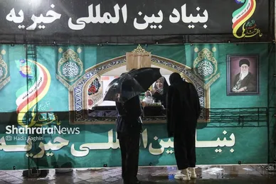 گزارش تصویری | باران رحمت الهی، برکت شصت‌ویکمین شب حضور مردم مشهد در خیابان