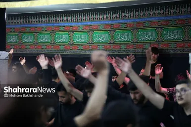 عکس‌هایی از مراسم علم کشیِ مهاجران افغانستانی در گلشهر مشهد