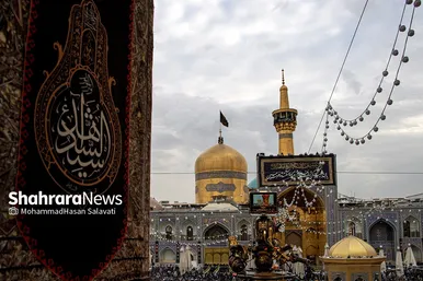 آئین اذن عزای حسینی و تعویض پرچم گنبد حرم مطهر رضوی