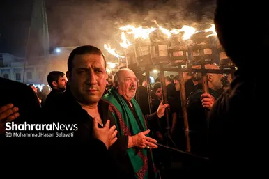 تصاویری از آئین سنتی مشعل گردانی نجفی‌های مقیم مشهد