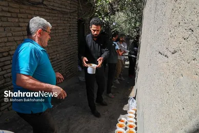 توزیع شله نذری همزمان با شهادت امام حسن عسکری(ع) در مشهد