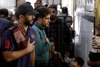 ویدئو | وفای به عهد قهرمانان کشتی به امام رضا(ع)