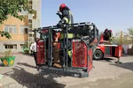 مهار آتش سوزی یک مجتمع اقامتی درغرب مشهد | نجات ۵۰ نفر از ساکنان + تصاویر