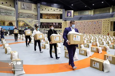 کمک مؤمنانه قهرمانان کشتی