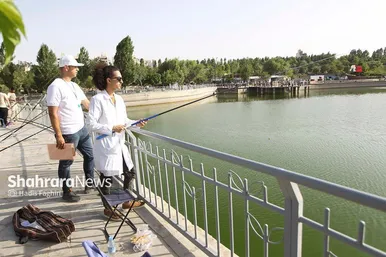 جشنواره ماهیگیری در رود پارک مشهد