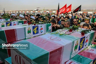 استقبال از پیکر مطهر ۱۲ شهید گمنام دفاع مقدس در فرودگاه هاشمی نژاد مشهد