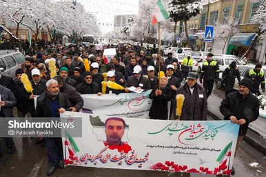 گزارش تصویری | تشییع پیکر شهدای مدافع امنیت در هوای برفی مشهد