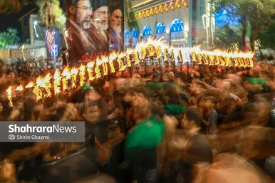 گزارش تصویری | آیین مشعل گردانی نجفی های مقیم مشهد در شب عاشورا