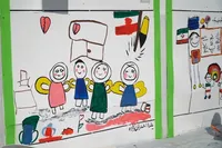 دیوار‌های مشهد میزبان نقاشی کودکان در یادبود شهدای میناب شد