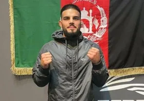 نصرت حق&zwnj;پرست، ورزشکار افغانستانی، دربرابر حریف آمریکایی خود به پیروزی رسید