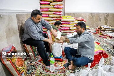 گزارش تصویری | تهیه ۱۰۰۰ بسته معیشتی برای ۱۰۰۰ خانواده نیازمند مشهدی