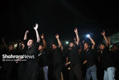 عکس‌هایی از مراسم علم کشیِ مهاجران افغانستانی در گلشهر مشهد