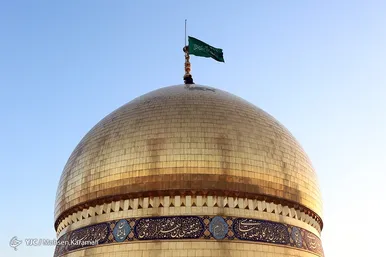 آیین تعویض پرچم گنبد حرم حضرت معصومه(س)