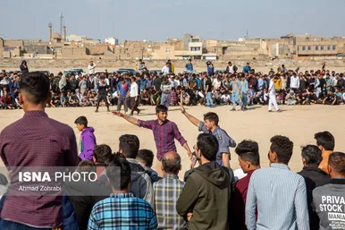 مسابقات کشتی سنتی افغانستانی‌ها به مناسبت نوروز در قم