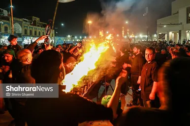 گزارش تصویری | آیین مشعل گردانی نجفی های مقیم مشهد در شب عاشورا