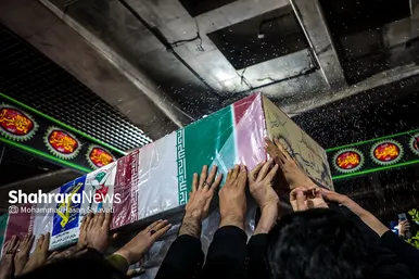 مراسم تدفین پیکر ۳ شهید گمنام در میدان شهدا مشهد