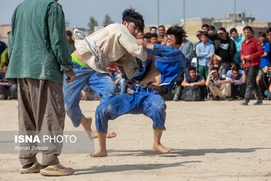 مسابقات کشتی سنتی افغانستانی‌ها به مناسبت نوروز در قم
